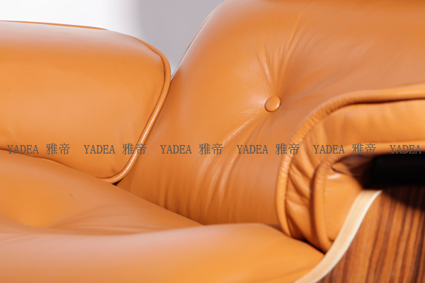 橙色核桃木貼皮的伊姆斯休閑椅（Walnut Eames Lounge Chair In Orange Leather）